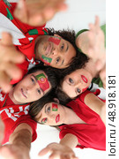 Portuguese football supporters. Стоковое фото, агентство Ingram Publishing / Фотобанк Лори