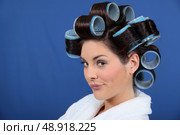 woman with hair curlers pouting. Стоковое фото, агентство Ingram Publishing / Фотобанк Лори