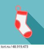 White Christmas stocking on blue background. Стоковая иллюстрация, агентство Ingram Publishing / Фотобанк Лори