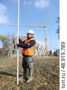 A foreman taking measure. Стоковое фото, агентство Ingram Publishing / Фотобанк Лори