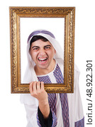 Arab with picture frame on white. Стоковое фото, агентство Ingram Publishing / Фотобанк Лори