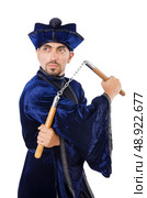 Martial arts master with nunchucks on white. Стоковое фото, агентство Ingram Publishing / Фотобанк Лори