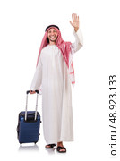 Arab man with luggage on white. Стоковое фото, агентство Ingram Publishing / Фотобанк Лори