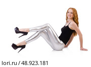 Young redhead girl in tight leggings. Стоковое фото, агентство Ingram Publishing / Фотобанк Лори