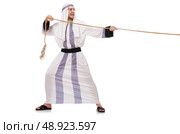 Arab man in tug of war concept. Стоковое фото, агентство Ingram Publishing / Фотобанк Лори