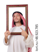 Arab with picture frame on white. Стоковое фото, агентство Ingram Publishing / Фотобанк Лори