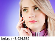 Attractive girl speaking on the mobile phone. Стоковое фото, агентство Ingram Publishing / Фотобанк Лори