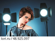 Young attractive girl with in the studio shooting. Стоковое фото, агентство Ingram Publishing / Фотобанк Лори