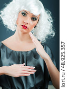 Blonde puppet in studio shooting. Стоковое фото, агентство Ingram Publishing / Фотобанк Лори