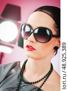 Fashion beauty concept with girl in studio. Стоковое фото, агентство Ingram Publishing / Фотобанк Лори