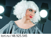 Young attractive girl with in the studio shooting. Стоковое фото, агентство Ingram Publishing / Фотобанк Лори