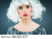 Blonde puppet in studio shooting. Стоковое фото, агентство Ingram Publishing / Фотобанк Лори