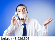 Businessman with his lips sealed. Стоковое фото, агентство Ingram Publishing / Фотобанк Лори