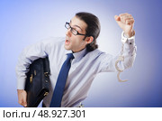 Businessman handcuffed for his crimes. Стоковое фото, агентство Ingram Publishing / Фотобанк Лори