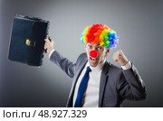 Clown businessman in funny business concept. Стоковое фото, агентство Ingram Publishing / Фотобанк Лори