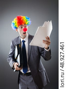 Clown businessman in funny business concept. Стоковое фото, агентство Ingram Publishing / Фотобанк Лори