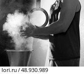 Gym Chalk Magnesium Carbonate hands clapping man for climbing workout. Стоковое фото, агентство Ingram Publishing / Фотобанк Лори