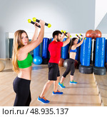 zumba dance cardio people group training at fitness gym workout exercise. Стоковое фото, агентство Ingram Publishing / Фотобанк Лори