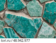 Vivid shades of blue and green dominate the unique patterns of amazonite stones, showcasing their natural beauty and intricacies in an artistic arrangement against a neutral backdrop Generative AI. Стоковое AI-изображение, AI-художник Юлия Петровская / Фотобанк Лори