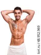 Attractive man posing with a white towel. Стоковое фото, агентство Ingram Publishing / Фотобанк Лори
