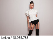 Sexy posing model in vintage stockings. Стоковое фото, агентство Ingram Publishing / Фотобанк Лори