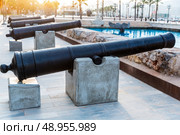 Cartagena cannon in naval museum with port at Murcia Spain. Стоковое фото, агентство Ingram Publishing / Фотобанк Лори