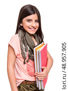 Beautiful little girl holding sketchbooks over white. Стоковое фото, агентство Ingram Publishing / Фотобанк Лори
