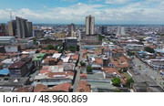 Aerial view of downtown Cali Colombia with buildings and busy streets. Стоковое видео, видеограф ALEJANDRO PEREZ ALVARES / Фотобанк Лори