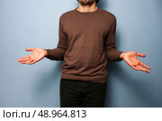 young man doesn’t know. Стоковое фото, агентство Ingram Publishing / Фотобанк Лори