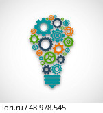 Lightbulb made of colored cog wheels abstract teamwork mind cooperation concept vector illustration. Стоковая иллюстрация, агентство Ingram Publishing / Фотобанк Лори