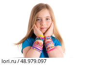 Loom rubber bands bracelets blond kid girl hands on face on white background. Стоковое фото, агентство Ingram Publishing / Фотобанк Лори