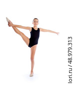 Kid girl rhythmic gymnastics exercises on white background. Стоковое фото, агентство Ingram Publishing / Фотобанк Лори