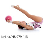 Kid girl ball rhythmic gymnastics exercise on white background. Стоковое фото, агентство Ingram Publishing / Фотобанк Лори