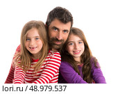 Happy family beard father and two kid daughters blue eyes on white background. Стоковое фото, агентство Ingram Publishing / Фотобанк Лори