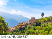 Fornalutx village aerial skyline in Majorca Balearic island Mallorca spain. Стоковое фото, агентство Ingram Publishing / Фотобанк Лори