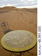 table and seat in  desert sahara morocco    africa yellow sand. Стоковое фото, агентство Ingram Publishing / Фотобанк Лори
