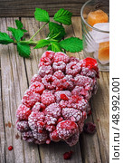 frozen ripe raspberry . Стоковое фото, агентство Ingram Publishing / Фотобанк Лори