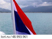 asia myanmar kho samui bay isle waving flag    in thailand and south china sea . Стоковое фото, агентство Ingram Publishing / Фотобанк Лори