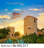 Javea Xabia el molins at sunset in Mediterranean Alicante at Spain. Стоковое фото, агентство Ingram Publishing / Фотобанк Лори