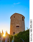 Javea Xabia el molins at sunset in Mediterranean Alicante at Spain. Стоковое фото, агентство Ingram Publishing / Фотобанк Лори