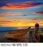Almeria Cabo de Gata beached boats in San Miguel beach of Spain. Стоковое фото, агентство Ingram Publishing / Фотобанк Лори