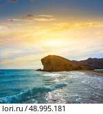 Almeria Playa del Monsul beach sunset at Cabo de Gata in Spain. Стоковое фото, агентство Ingram Publishing / Фотобанк Лори