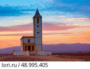 Almeria Cabo de Gata Salinas church sunset in San Miguel Beach at Spain. Стоковое фото, агентство Ingram Publishing / Фотобанк Лори