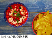 Ceviche de Camaron shrimp and mexican nachos plate on blue wood table. Стоковое фото, агентство Ingram Publishing / Фотобанк Лори