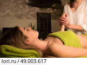 Young woman having a hands massage at the spa. Стоковое фото, агентство Ingram Publishing / Фотобанк Лори
