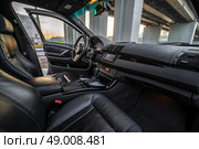 KRASNOYARSK, RUSSIA - May 23, 2025: Black BMW X5 E53. Редакционное фото, фотограф Плотников Дмитрий / Фотобанк Лори