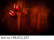 Two red dices showing a pair of sixes. Стоковое фото, агентство Ingram Publishing / Фотобанк Лори