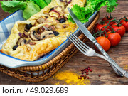 Shawarma. baked in the oven meat shawarma with vegetables in a rustic style.The image is tinted. Стоковое фото, агентство Ingram Publishing / Фотобанк Лори