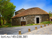 O Cebreiro by the way of Saint James in Galicia Palloza traditional celtic hut. Стоковое фото, агентство Ingram Publishing / Фотобанк Лори