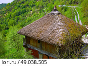 O Cebreiro by the way of Saint James in Galicia Palloza traditional celtic hut. Стоковое фото, агентство Ingram Publishing / Фотобанк Лори